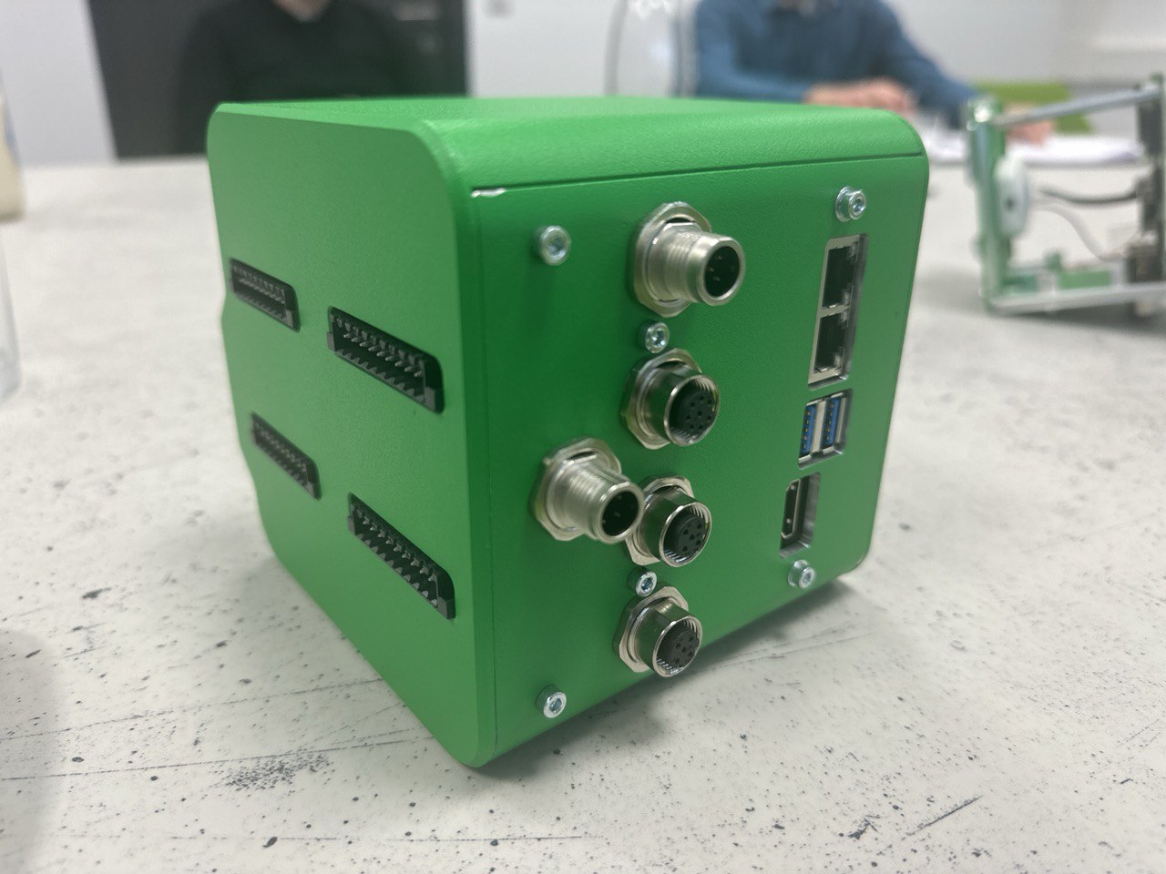 XOOO Cube control unit showing industrial connectors and ports